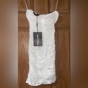 Brand new with tags UK Sz6 fits like a Xs/S